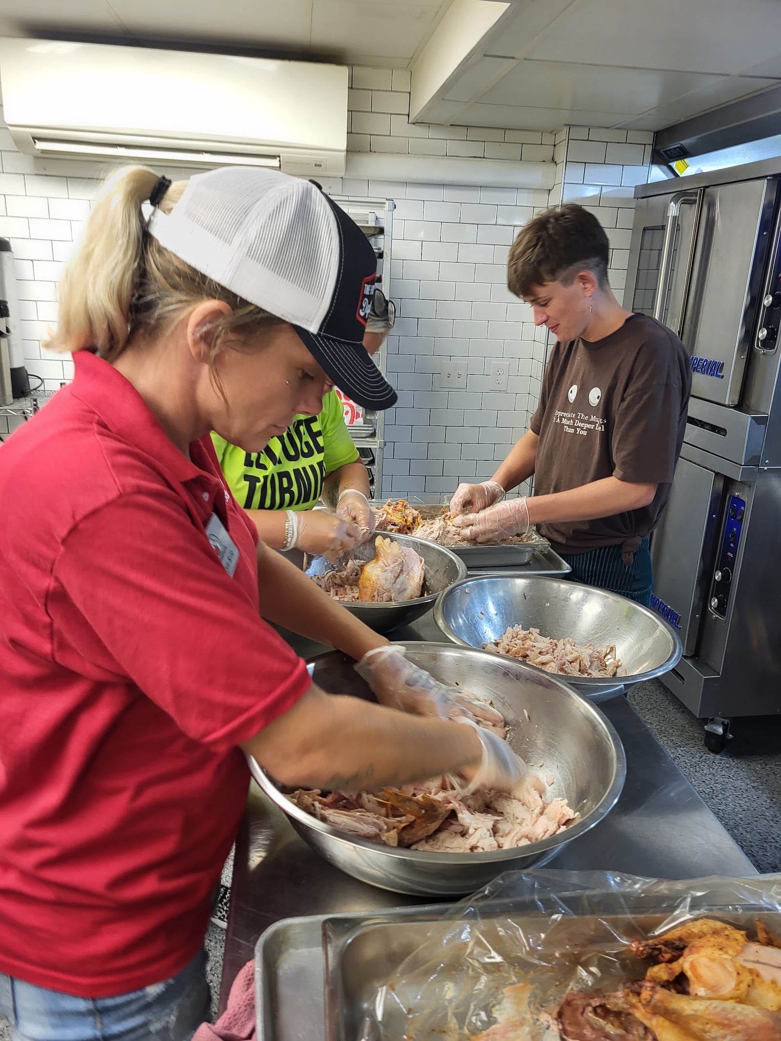 Volunteers are always needed at The Foodbank Inc. to prepare and serve food to those who are hungry. CONTRIBUTED