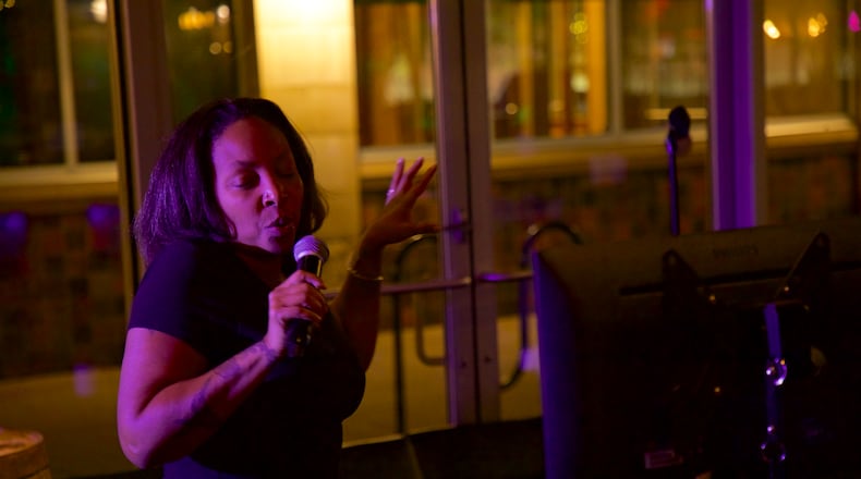 Karaoke contestant at Limelight Entertainment's Dayton Karaoke Idol semi-finals. Credit: Brandon Berry