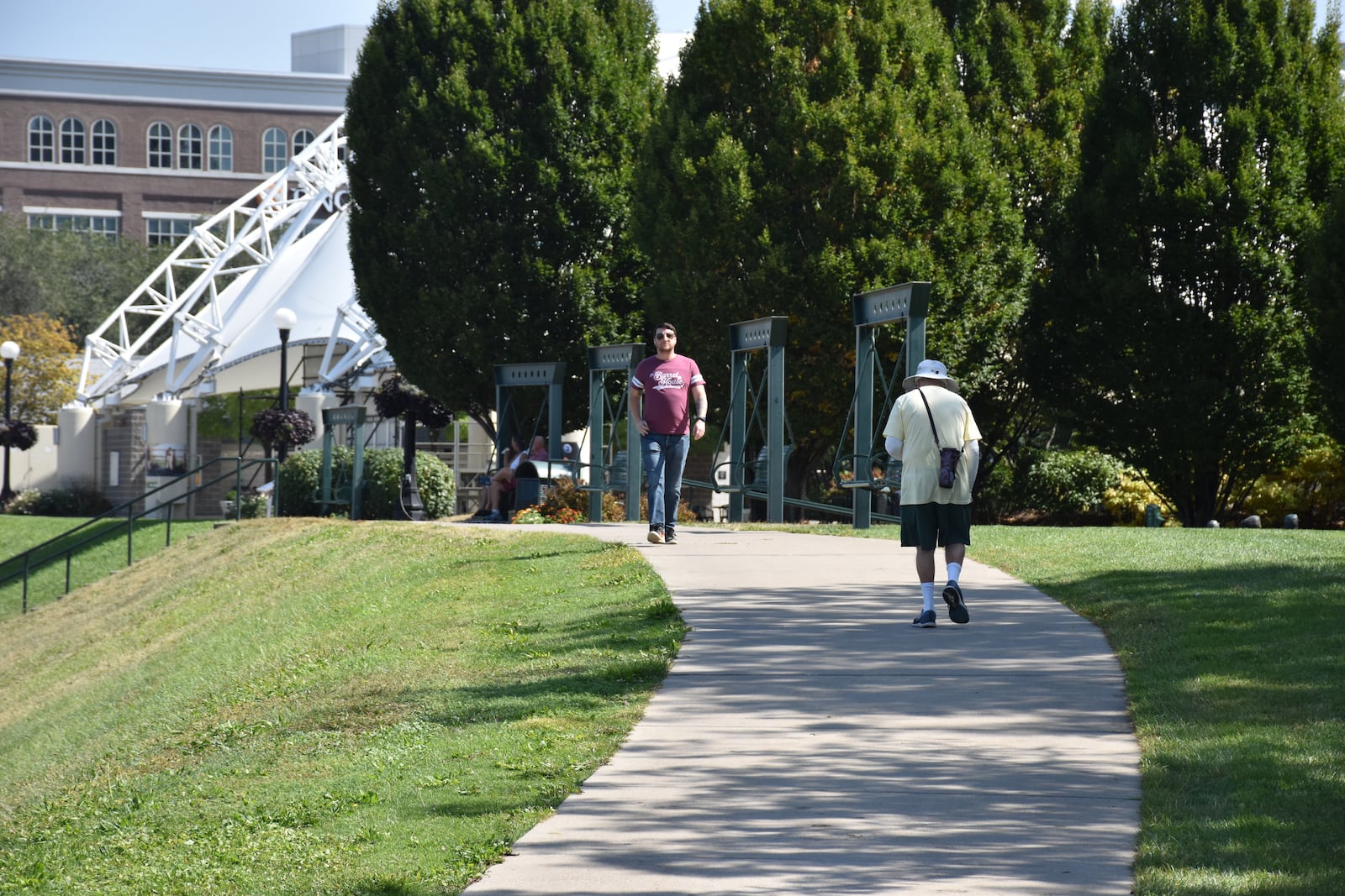 People walk along the River Walk trail at RiverScape on Thursday, Sept. 18, 2025. CORNELIUS FROLIK / STAFF