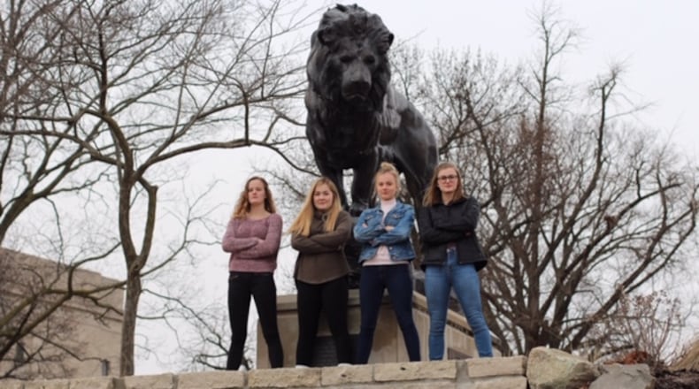 Oakwood High School sophomores ( left to right)  Claire Parker,  Dana Clark,  Zoe Waller and Ryann Mescher launched the Femme Aid Collaborative to  address period poverty in the Dayton area. They are pictured at the Dayton Art Institute.