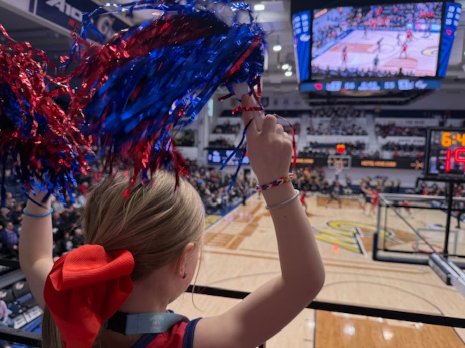 Dayton fans Matilda Trick cheers on the Flyers during a game against George Washington on Friday, Feb. 27, 2026, at the Charles E. Smith Center in Washington, D.C. Contributed photo