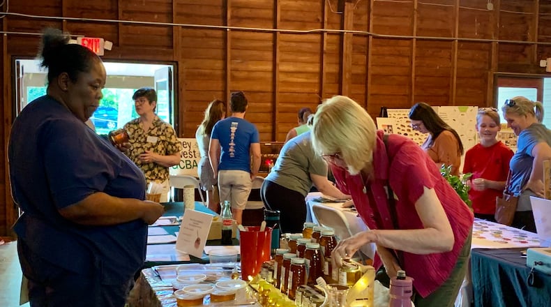 The Greene County Beekeepers Association Honey Harvest, held June 15, aims to raise awareness of beekeeping and native plants. LONDON BISHOP/STAFF