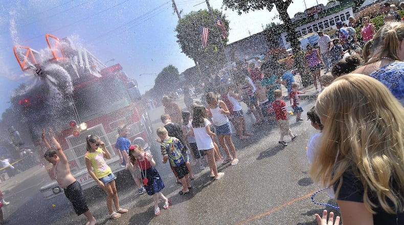 Franklin's 4th of July Parade plans to continue to live up to it's billing as "the wettest ever" as hundreds lined the streets of downtown Franklin for the parade. Splash Zones were set up along the parade route where spectators were treated to a very wet and refreshing soaking by water guns to Fire Engine hoses.  FILE PHOTO