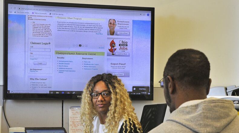Danique Carter, a job coach at the Goodwill Easterseals, helps clients without internet get access to unemployment. MARSHALL GORBYSTAFF