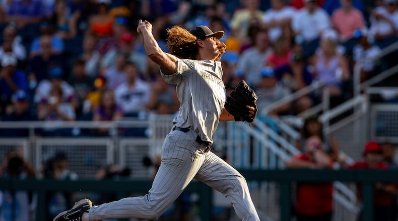 Wake Forest pitcher Rhett Lowder throws to an LSU batter during the fifth inning in a baseball game at the NCAA College World Series in Omaha, Neb., Thursday, June 22, 2023. (AP Photo/John Peterson)