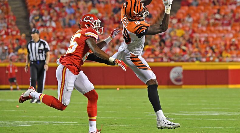 KANSAS CITY, MO - AUGUST 10: Auden Tate #19 of the Cincinnati Bengals catches a pass against Michael Hunter #25 of the Kansas City Chiefs in the fourth quarter during a preseason game at Arrowhead Stadium on August 10, 2019 in Kansas City, Missouri. (Photo by Peter Aiken/Getty Images)