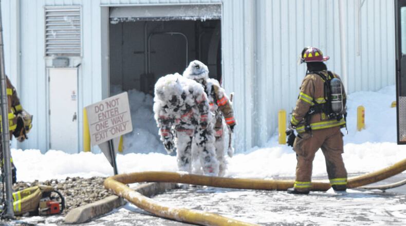 Eight firefighters were injured while responding to a hangar at Wilmington Air Park that had filled with fire suppression foam. A man died in the incident that happened Aug. 7, 2022. TOM BARR/WILMINGTON NEWS JOURNAL