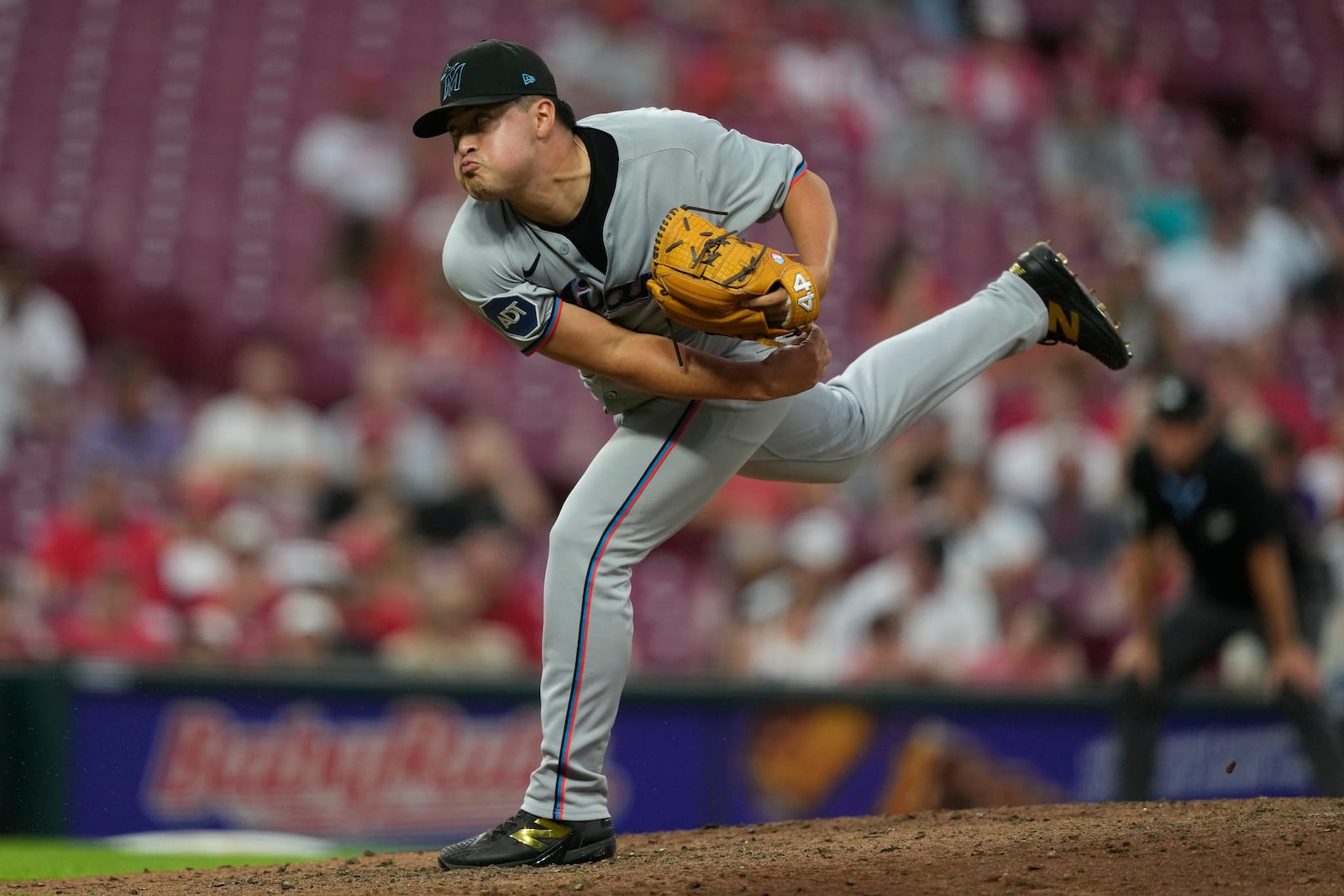 Miami Marlins pitcher Valente Bellozo throws during the sixth inning of a baseball game against the Miami Marlins in Cincinnati, Wednesday, July 9, 2025. (AP Photo/Carolyn Kaster)