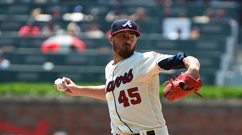 ATLANTA, GEORGIA - APRIL 28: Kevin Gausman #45 of the Atlanta Braves pitches in the second inning against the Colorado Rockies at SunTrust Park on April 28, 2019 in Atlanta, Georgia. (Photo by Logan Riely/Getty Images)