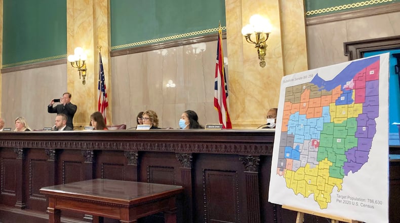 FILE - Members of the Ohio Senate Government Oversight Committee hear testimony on a new map of state congressional districts, Nov. 16, 2021, at the Ohio Statehouse in Columbus, Ohio. Advocacy groups fighting Ohio's political maps in court formally objected Thursday, Oct. 5, 2023, to the latest round of Statehouse districts, which they see as unfairly drawn to favor Republicans. (AP Photo/Julie Carr Smyth, File)
