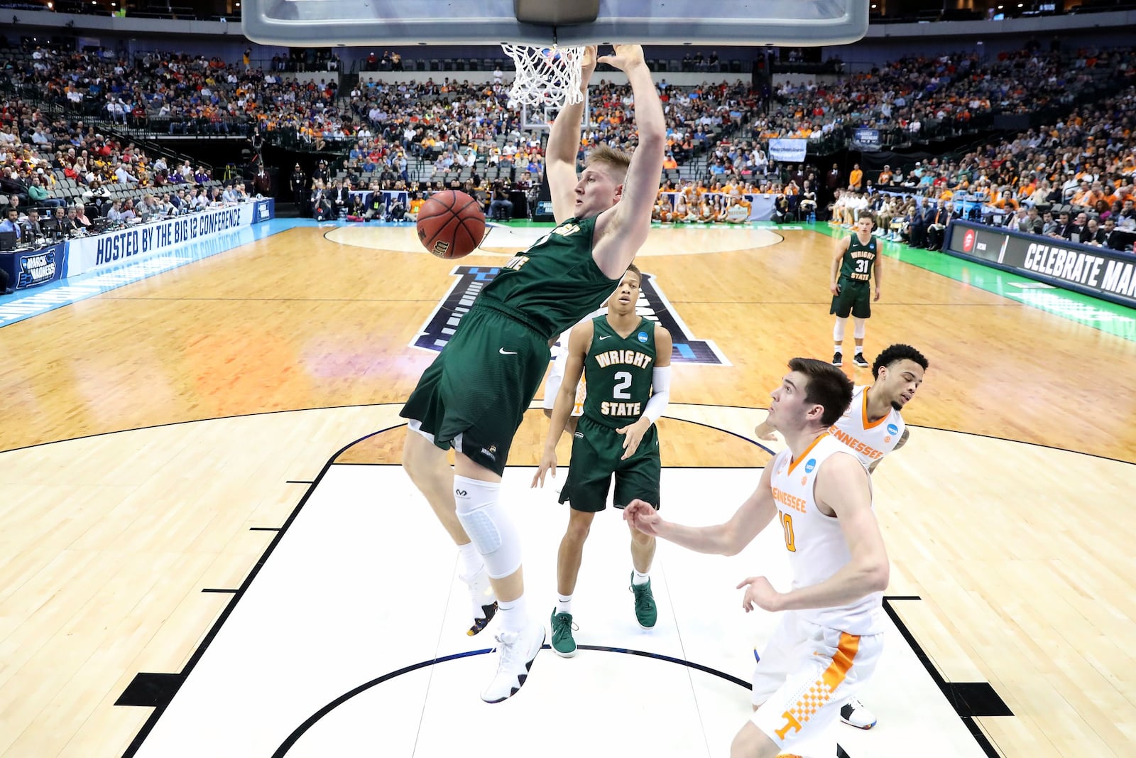 DALLAS, TX - MARCH 15: Loudon Love #11 of the Wright State Raiders dunks the ball in the second half against the Tennessee Volunteers in the first round of the 2018 NCAA Men’s Basketball Tournament at American Airlines Center on March 15, 2018 in Dallas, Texas. (Photo by Ronald Martinez/Getty Images)