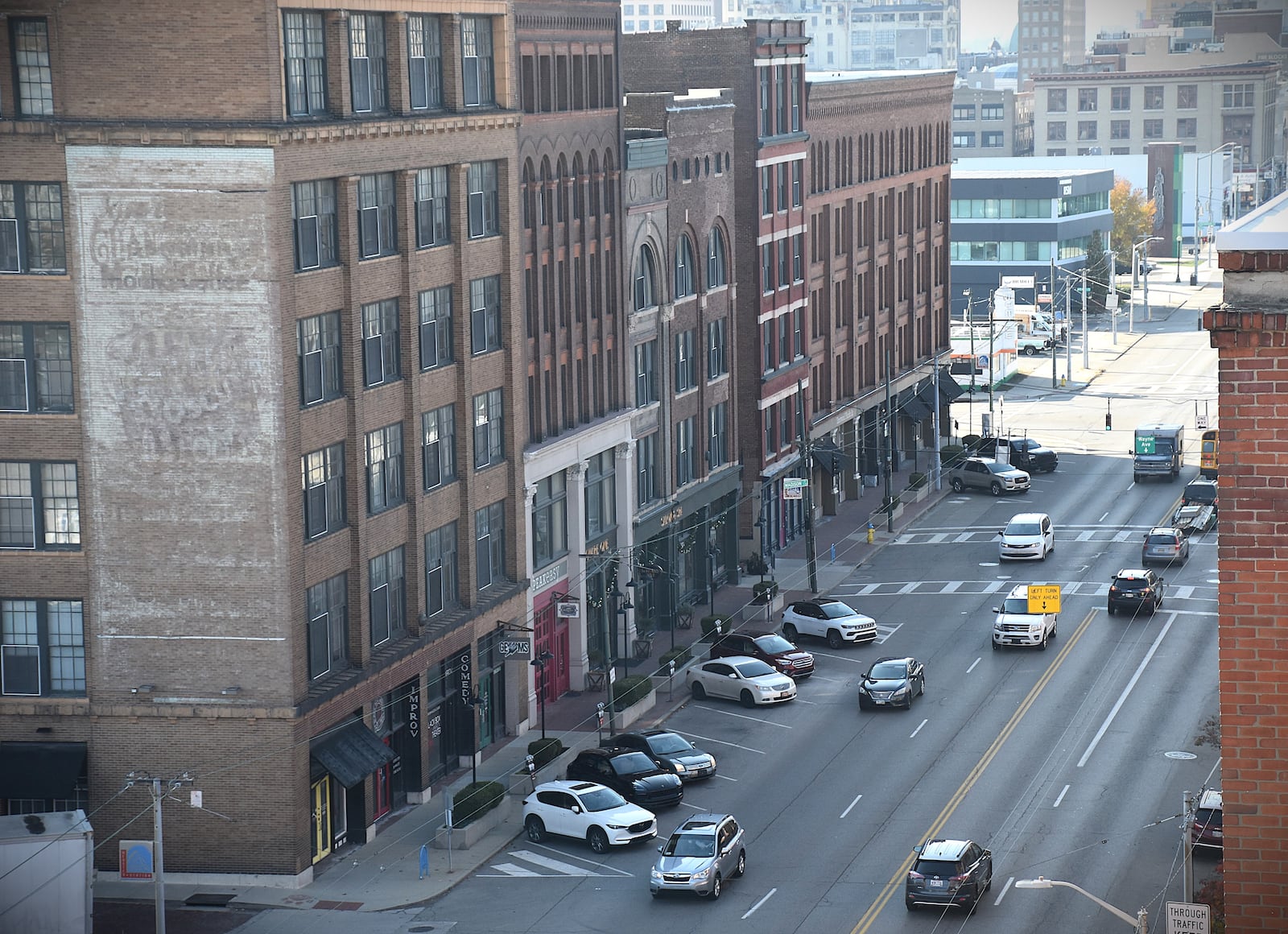 The posted speed limit on Third Street is 35 mph. The city of Dayton is going to evaluate commercial corridors and may lower the speed limit in some business districts. CORNELIUS FROLIK / STAFF