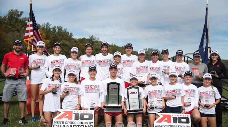 Dayton's men's and women's cross country teams pose for a photo after winning Atlantic 10 championships on Saturday, Oct. 28, 2017, in Fairfax, Va.