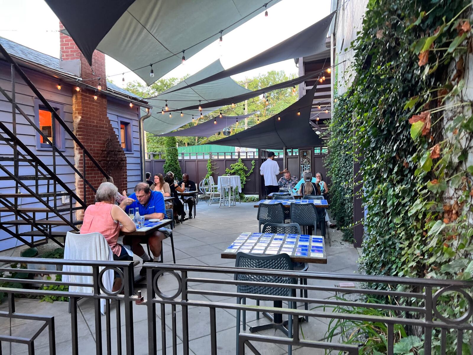 The patio at Ye Olde Trail Tavern is a little umbrellaed oasis parked in the middle of Yellow Springs main drag.