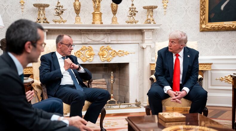 President Donald Trump meets with Chancellor Friedrich Merz of Germany in the Oval Office of the White House in Washington, on Thursday, May 5, 2025. As wars and conflicts overseas become only more intractable, Trump has frequently sought to pivot to the red-meat domestic topics that he knows will fire up his base. (Doug Mills/The New York Times)