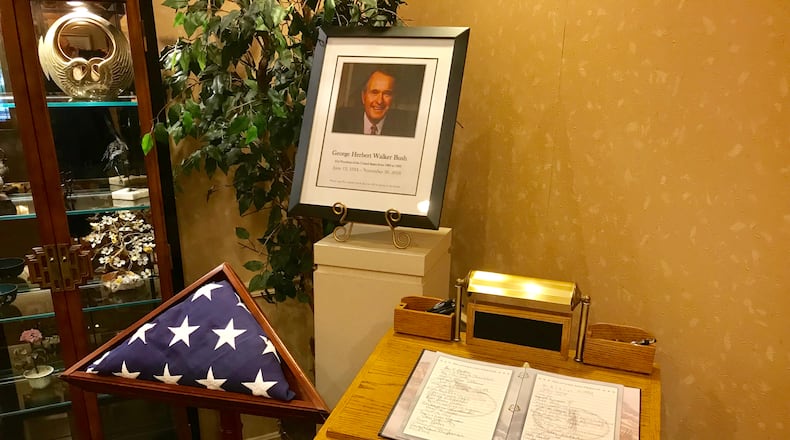 Routsong Funeral Home in Kettering is inviting guests on Tuesday to sign a registry book in honor of former President George H.W. Bush. The book will be sent to the Bush family. CONTRIBUTED
