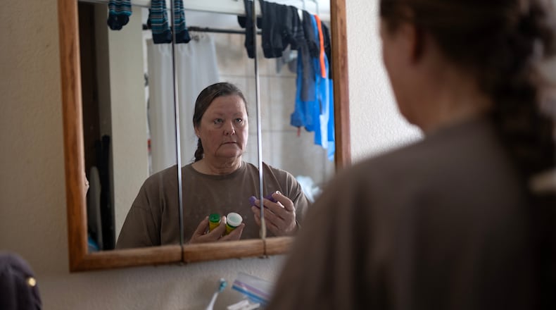 **EDS: RETRANSMISSION OF XNYT0498 OF FEB. 25, 2025 TO CORRECT YEAR IN CAPTION TO 2025.** Jeannie Brown, who makes around $25,000 yearly as a part-time school bus driver, falling in the so-called coverage gap now covered in many states by the Medicaid expansion under Affordable Care Act, at home in Belgrade, Mont. on Feb. 21, 2025. House Republicans hunting for ways to pay for President Donald Trump’s desired tax cuts have called for cutting the federal government’s share of Medicaid spending. (Janie Osborne/The New York Times)