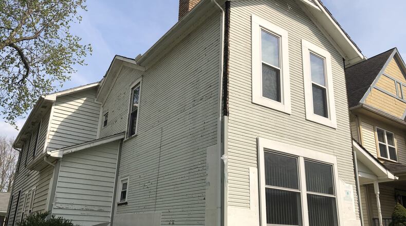 The Landmarks Commission denied a request to install vinyl siding on this home on Mound Street in the Wright Dunbar historic district. CORNELIUS FROLIK / STAFF