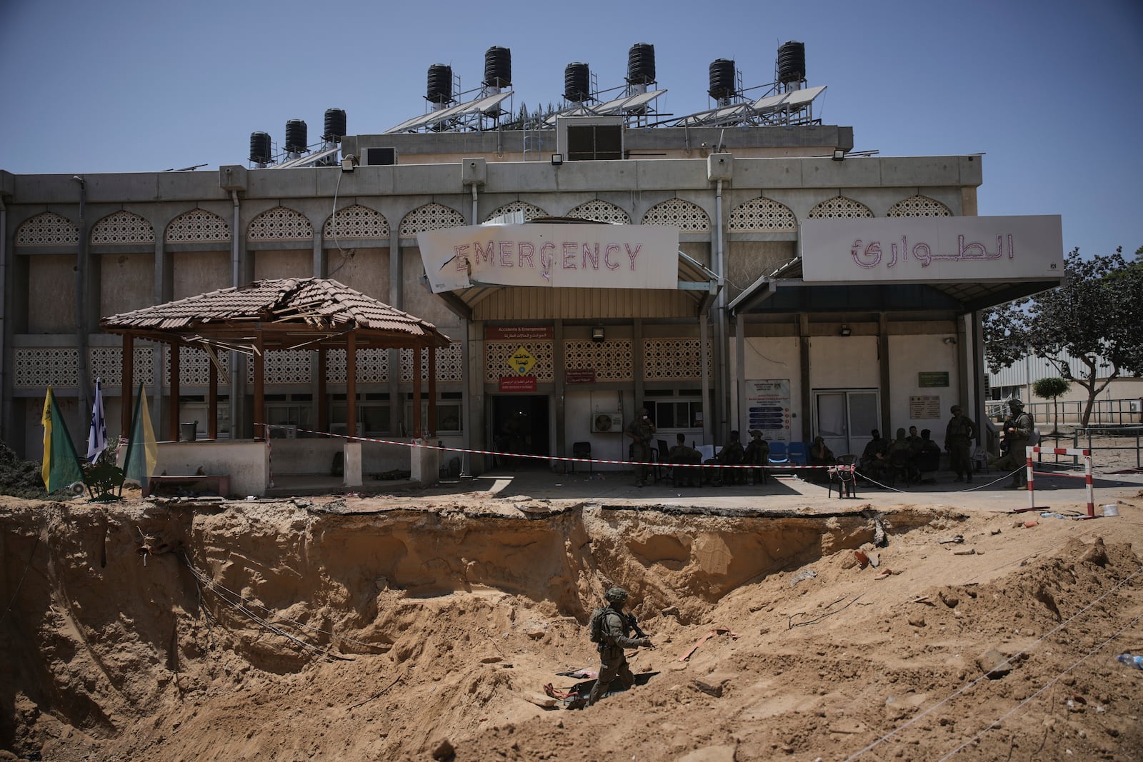 Israeli soldiers take up position at the European Hospital in Khan Younis, southern Gaza, where the military claims that Hamas militants operated in a tunnel beneath the facility, on Sunday, June 8, 2025. (AP Photo/Ohad Zweigenberg)