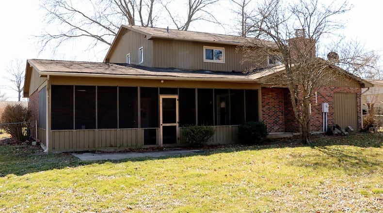 Patio doors opened to a covered patio that could be enclosed for additional living space. The basement is finished into two separate rooms.