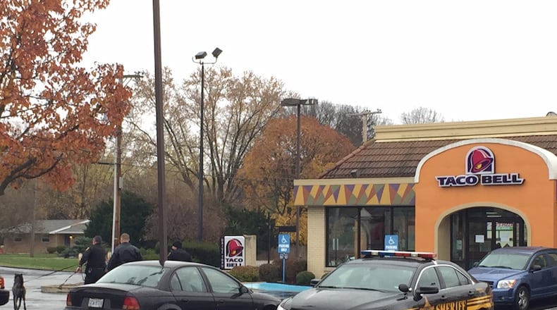 Sheriff’s deputies responded to the Taco Bell on Far Hills Avenue this morning after receiving a report that two armed men robbed the restaurant at gunpoint. JAROD THRUSH / STAFF