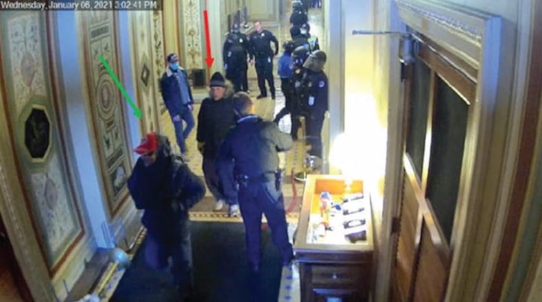 These photos from a federal court document allegedly show twin brothers Steven and Robert Hanna in the crowd of rioters at the U.S. Capitol building on Jan. 6, 2021.