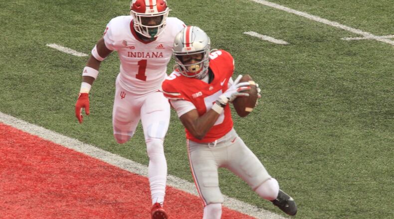 Garrett Wilson catches a touchdown pass for Ohio State against Indiana on Saturday, Nov. 22, 2020, at Ohio Stadium in Columbus. David Jablonski/Staff