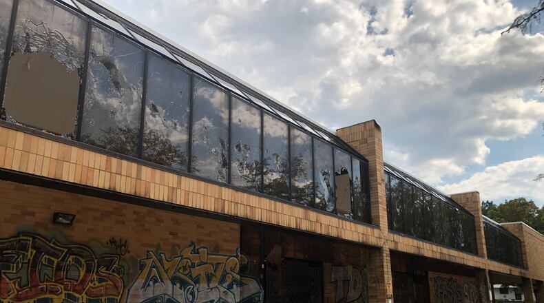 The old Kroger at 900 N. Gettysburg Ave. has been purchased by SugarCreek, a food manufacturer that employs more than 475 workers in Dayton. The eyesore will be renovated and reused, more than a decade after the grocery store closed down. CORNELIUS FROLIK / STAFF