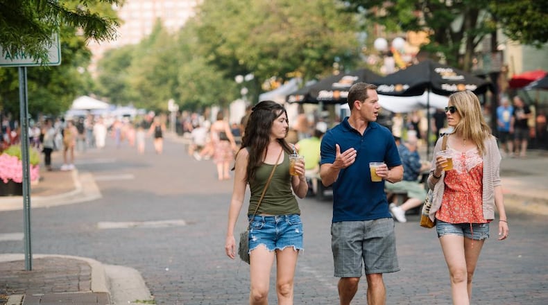 Attendees enjoy First Friday in the Oregon District. CONTRIBUTED