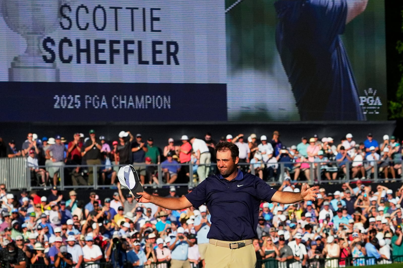 Scottie Scheffler celebrates after winning the PGA Championship golf tournament at the Quail Hollow Club, Sunday, May 18, 2025, in Charlotte, N.C. (AP Photo/Matt York)