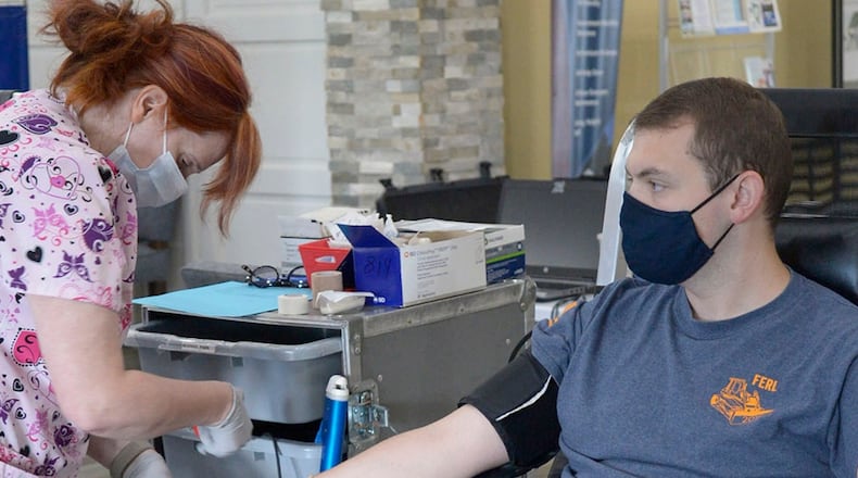 Second Lt. Dylan Hazlett, Air Force Institute of Technology, donates blood Sept. 23 during a drive at Wright-Patterson Air Force Base. The Armed Services Blood Program mission is to provide blood and blood products to U.S. armed forces needed on the battlefield, as well as in military treatment facilities worldwide. U.S. AIR FORCE PHOTO/SENIOR AIRMAN EMILY RUPERT