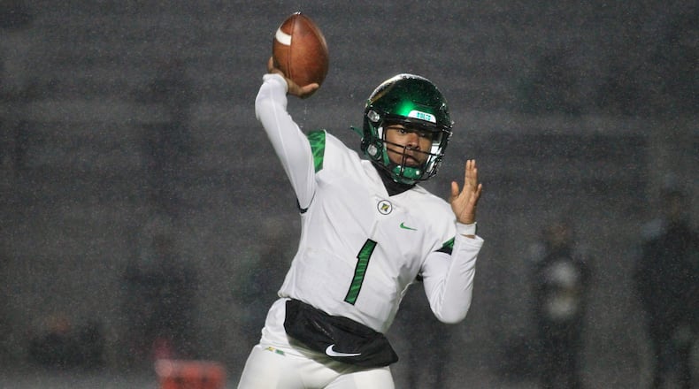 Northmont's Deuce Cortner throws a pass against Springfield on Friday, Oct. 22, 2021, at Springfield. David Jablonski/Staff