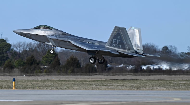 This photo provided by the U.S. Air Force shows a U.S. Air Force pilot taking off in an F-22 Raptor at Joint Base Langley-Eustis, Va., Saturday, Feb. 4, 2023. At the direction President Joe Biden, military aircraft brought down a high altitude surveillance balloon off the coast of South Carolina. (Airman 1st Class Mikaela Smith/U.S. Air Force via AP)