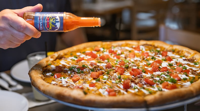 After debuting in 2024, Skyline Chili and Dewey’s Pizza have brought back the Skyline Dip Deluxe Pizza (THE MEISBERGERS)