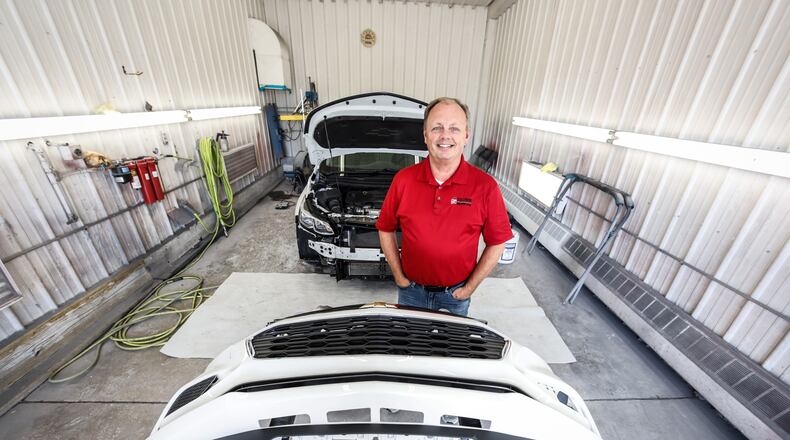 Dean Wright worked in the corporate world for 35 years, and instead of retiring,  he bought New Lebanon Body, Frame and Tech. Jim Noelker/Staff