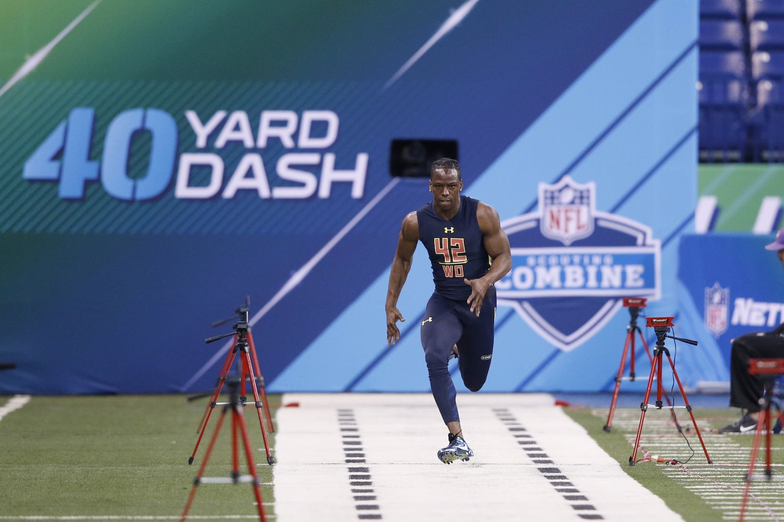 Wide receiver John Ross of Washington runs the 40-yard dash in an unofficial record time of 4.22 seconds at the NFL Combine at Lucas Oil Stadium on March 4, 2017 in Indianapolis. (Photo by Joe Robbins/Getty Images)