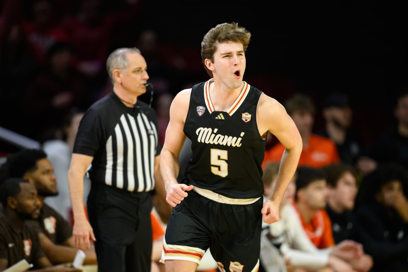 Miami's Peter Suder celebrates after hitting a 3-pointer during the first half of their game against Bowling Green on Friday, Feb. 20, 2026 at Millet Hall. JEREMY MILLER / CONTRIBUTED PHOTO