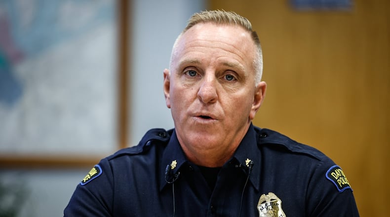 Dayton Police Major, Brian Johns talks Dayton media about the double homicide over the weekend at the Shell on West Third St. and Gettysburg Ave. JIM NOELKER/STAFF