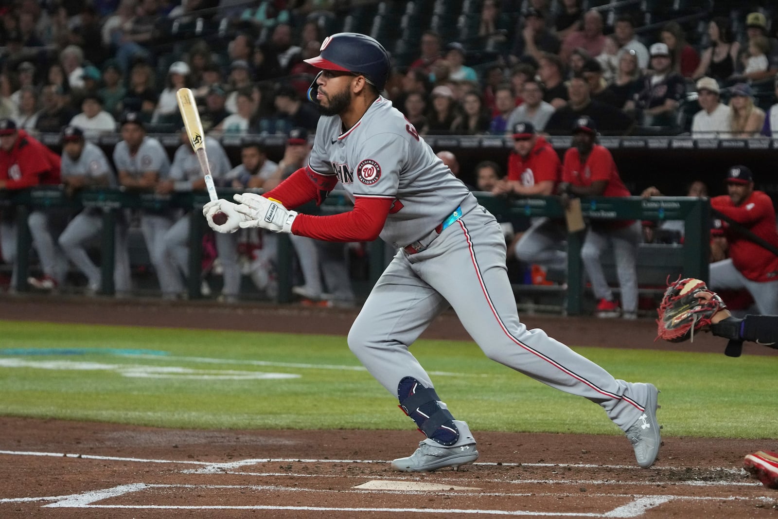 Washington Nationals' Luis García Jr. hits a two-run double against the Arizona Diamondbacks in the first inning during a baseball game, Saturday, May 31, 2025, in Phoenix. (AP Photo/Rick Scuteri)
