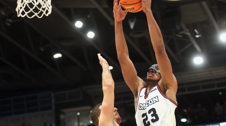 Dayton's Zed Key dunks against New Mexico State on Wednesday, Nov. 20, 2024, at UD Arena. David Jablonski/Staff