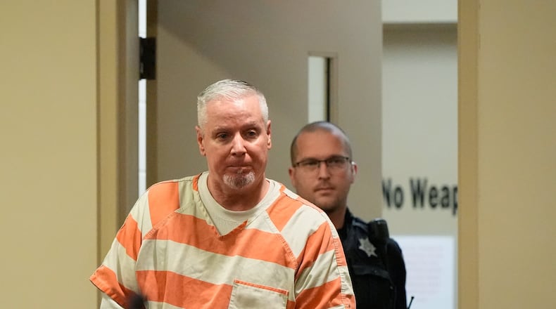 FILE - Colin Gray, the father of Apalachee High School shooting suspect Colt Gray, arrives to the courtroom at the Barrow County courthouse on Thursday, Dec. 18, 2025, in Winder,Ga. (AP Photo/Brynn Anderson, File)