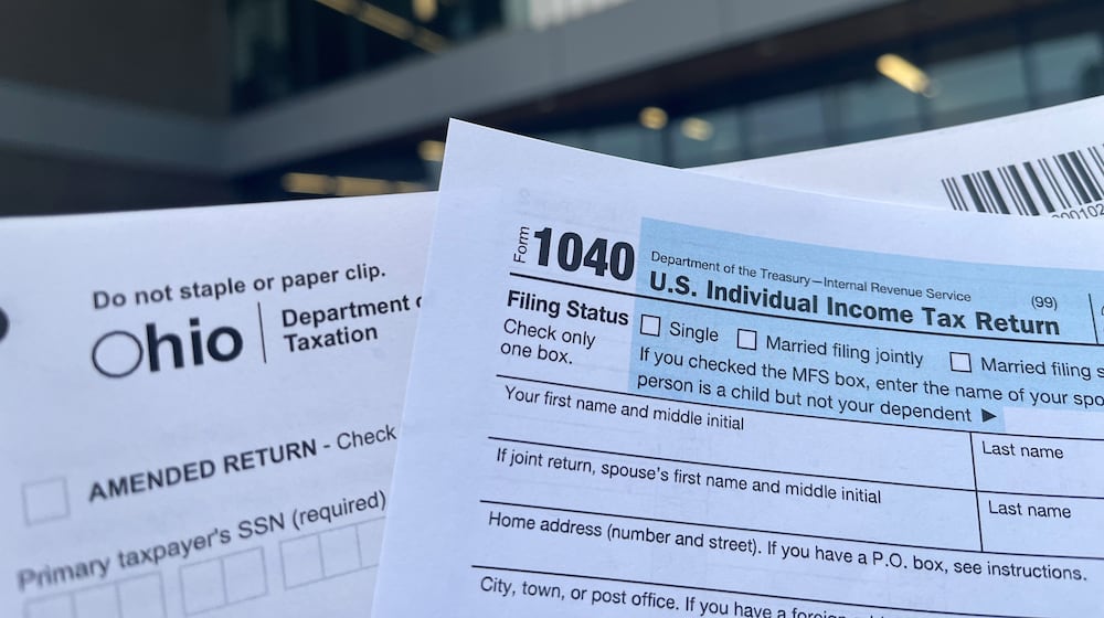 Federal and state tax return forms are available at sites like the Dayton Metro Library. CORNELIUS FROLIK / STAFF