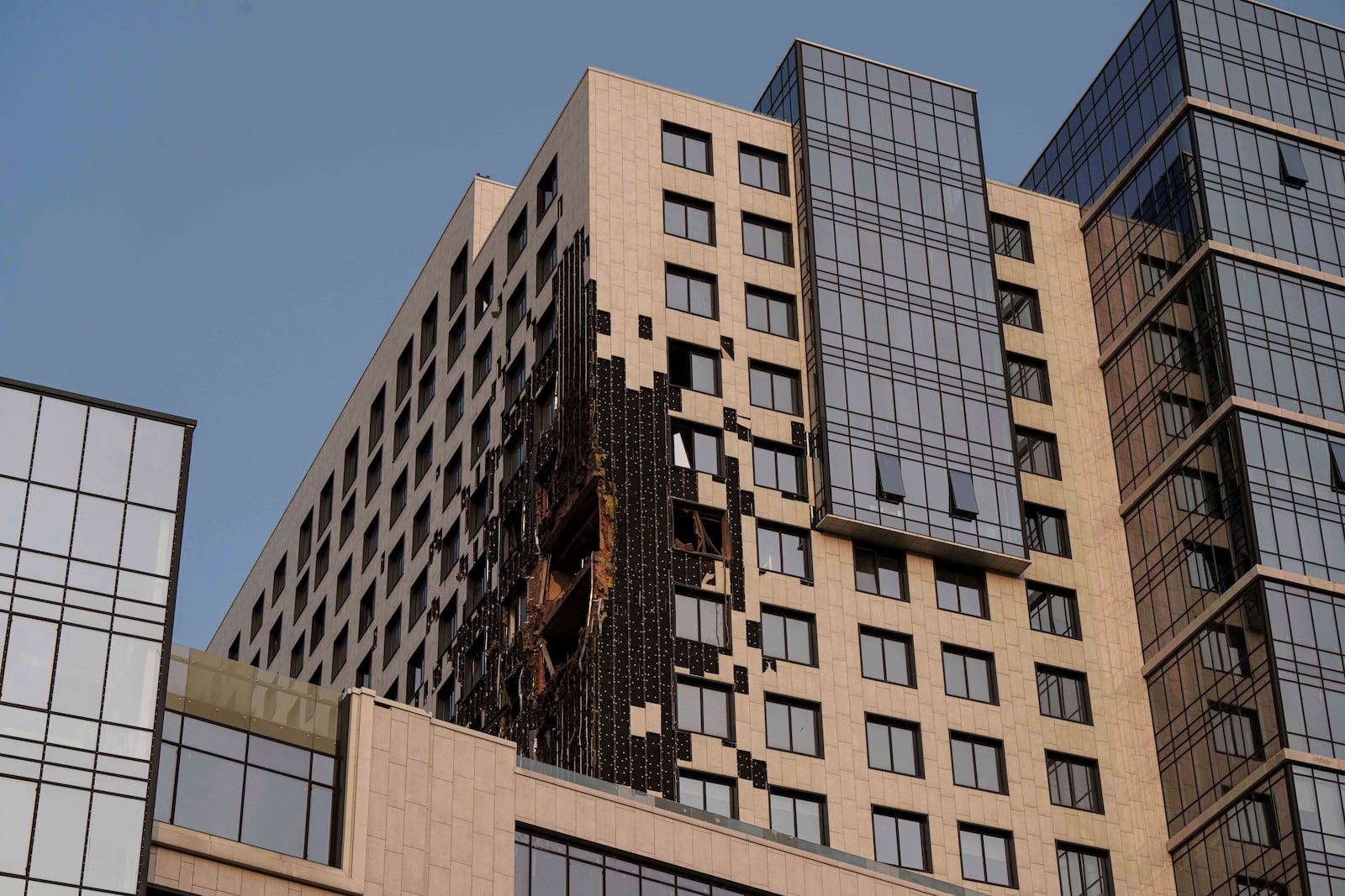 FILE - A multi-storey building is seen damaged by a Russian drone strike on Kyiv, Ukraine, Tuesday, June 10, 2025. (AP Photo/Evgeniy Maloletka, file)