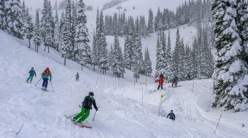 FILE: A crowd of skiers were happy with fresh, soft snow to start out  the 2016-17 season at Crystal Mountain, November 25, 2016. (Peter Haley/The News Tribune/TNS)