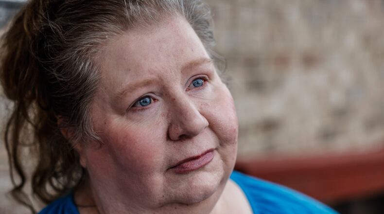 Cathy Masters survived the 1973 Xenia tornado and the Memorial Day tornado that damaged her Beavercreek home five years ago. JIM NOELKER/STAFF