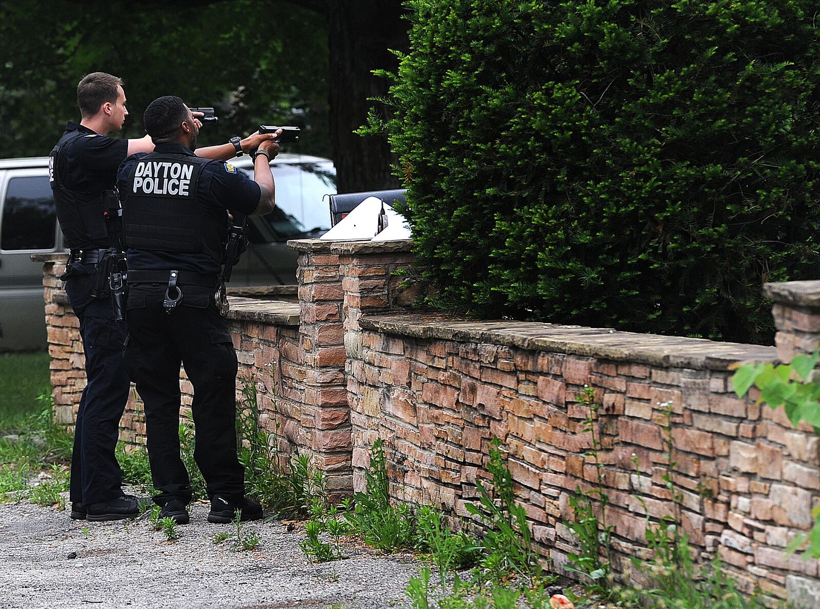 Montgomery County sheriff's deputies and Dayton police held a juvenile at gun point after he was seen running through a neighborhood near North Dixie Drive with a handgun Monday morning June 19, 2023. The juvenile was apprehended hiding in a garden behind a house on Ridge Road. MARSHALL GORBY\STAFF