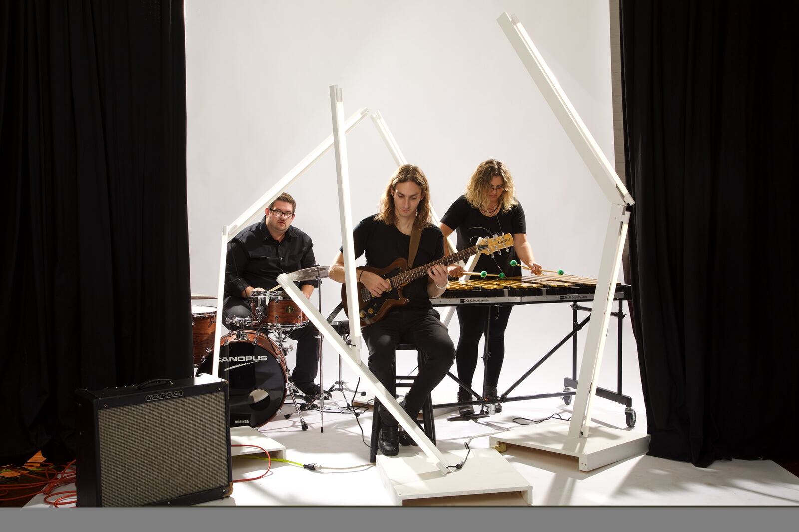 Cincinnati-based instrumental post-rock group Us, Today, (left to right) Jeff Mellott, Joel Griggs and Kristin Agee perform at the Trolley Stop in Dayton on Saturday, Oct. 26. CONTRIBUTED
