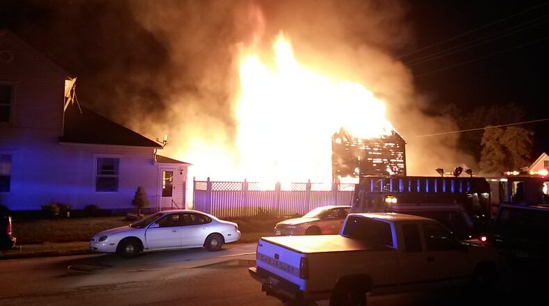A barn was destroyed and two houses were damaged in Arcanum Friday morning.