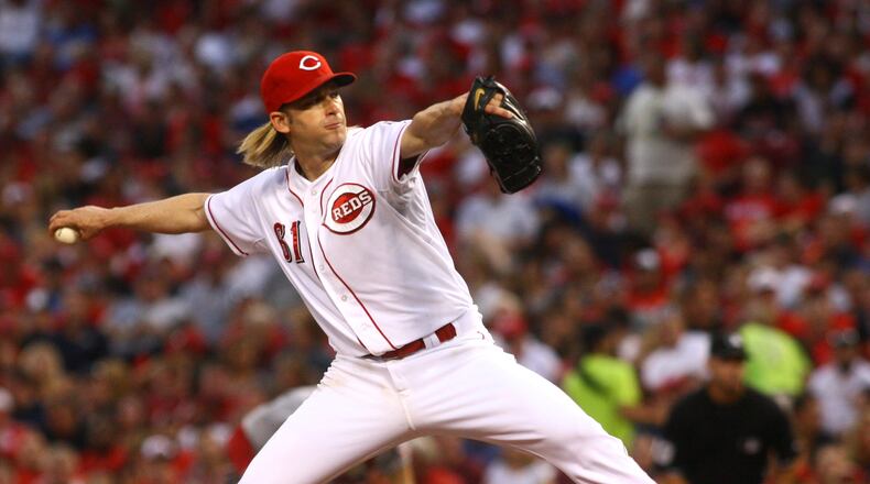 The Reds’ Bronson Arroyo pitches against the Cardinals on Friday, Aug. 2, 2013, at Great American Ball Park in Cincinnati. David Jablonski/Staff