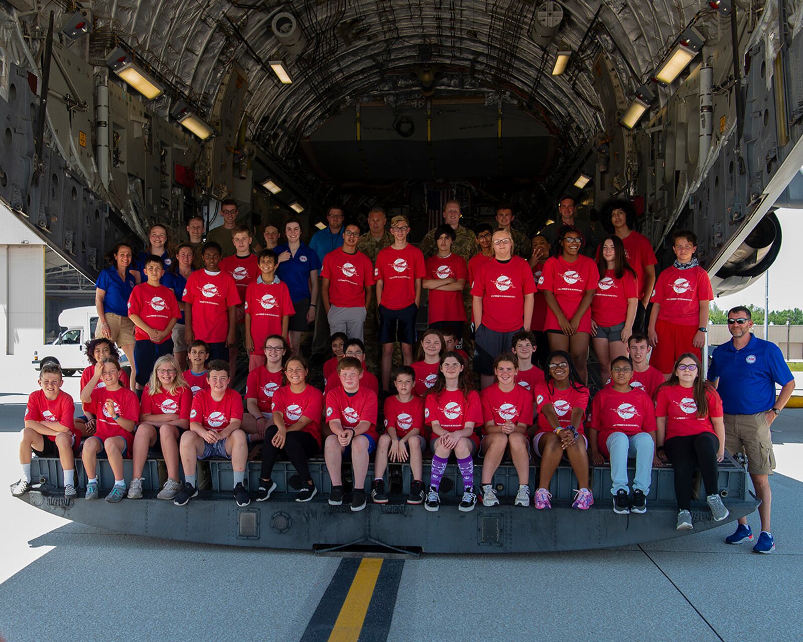 Air Camp attendees and staff pose for a class photo with 445th Airlift Wing members on the ramp of a C-17 Globemaster III at Wright-Patterson Air Force Base on June 14. U.S. AIR FORCE PHOTO/R.J. ORIEZ